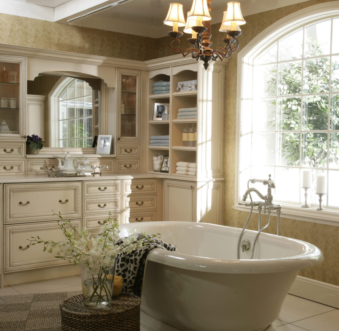 A room with a bath tub and big mirror