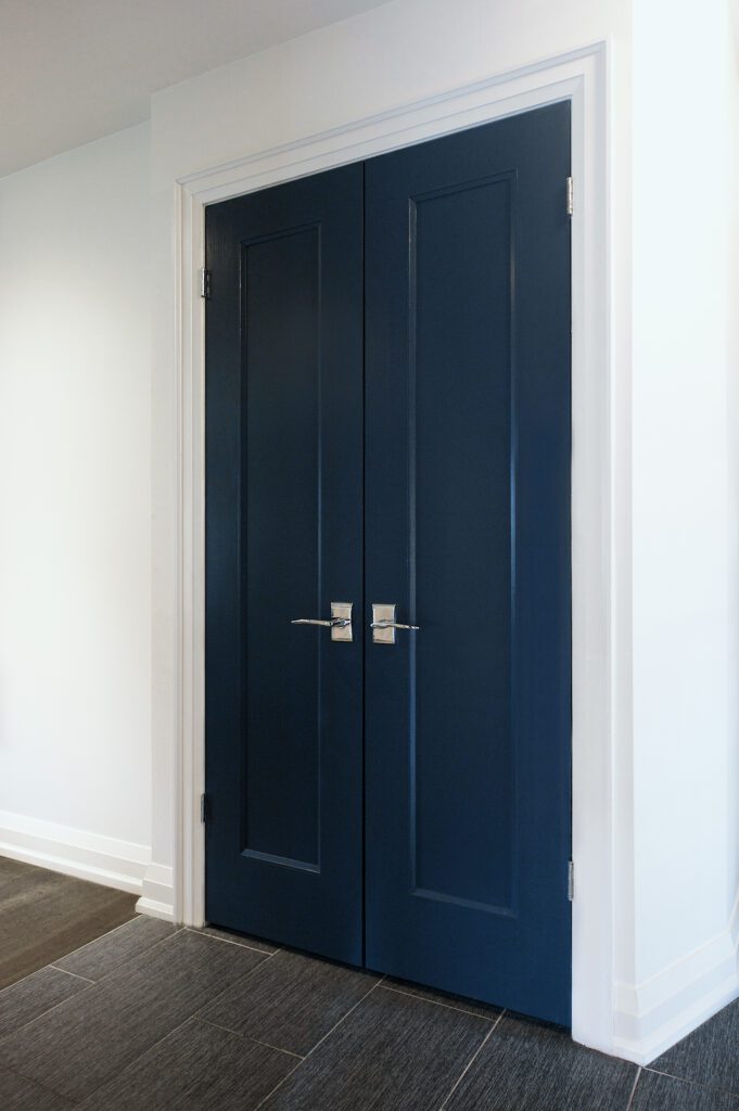 a blue color door of a bedroom