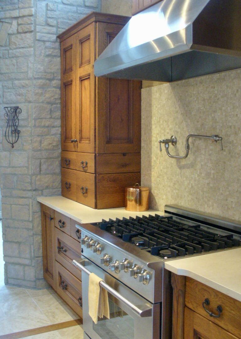 A designer kitchen design with a chimney